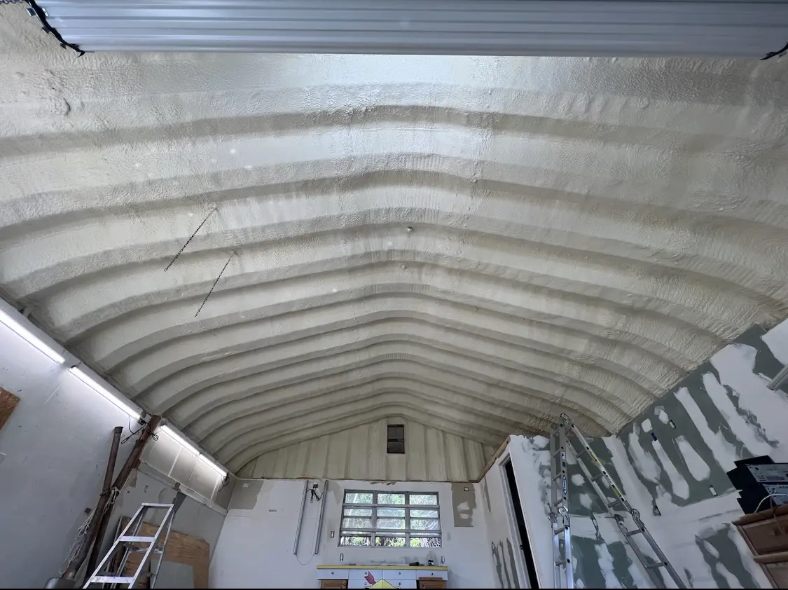 Spray polyurethane foam applied to the underside of a metal roof deck in Mount Dora